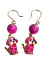 Rikku Guay, Aretes de bolas/dijes de perrito y bola